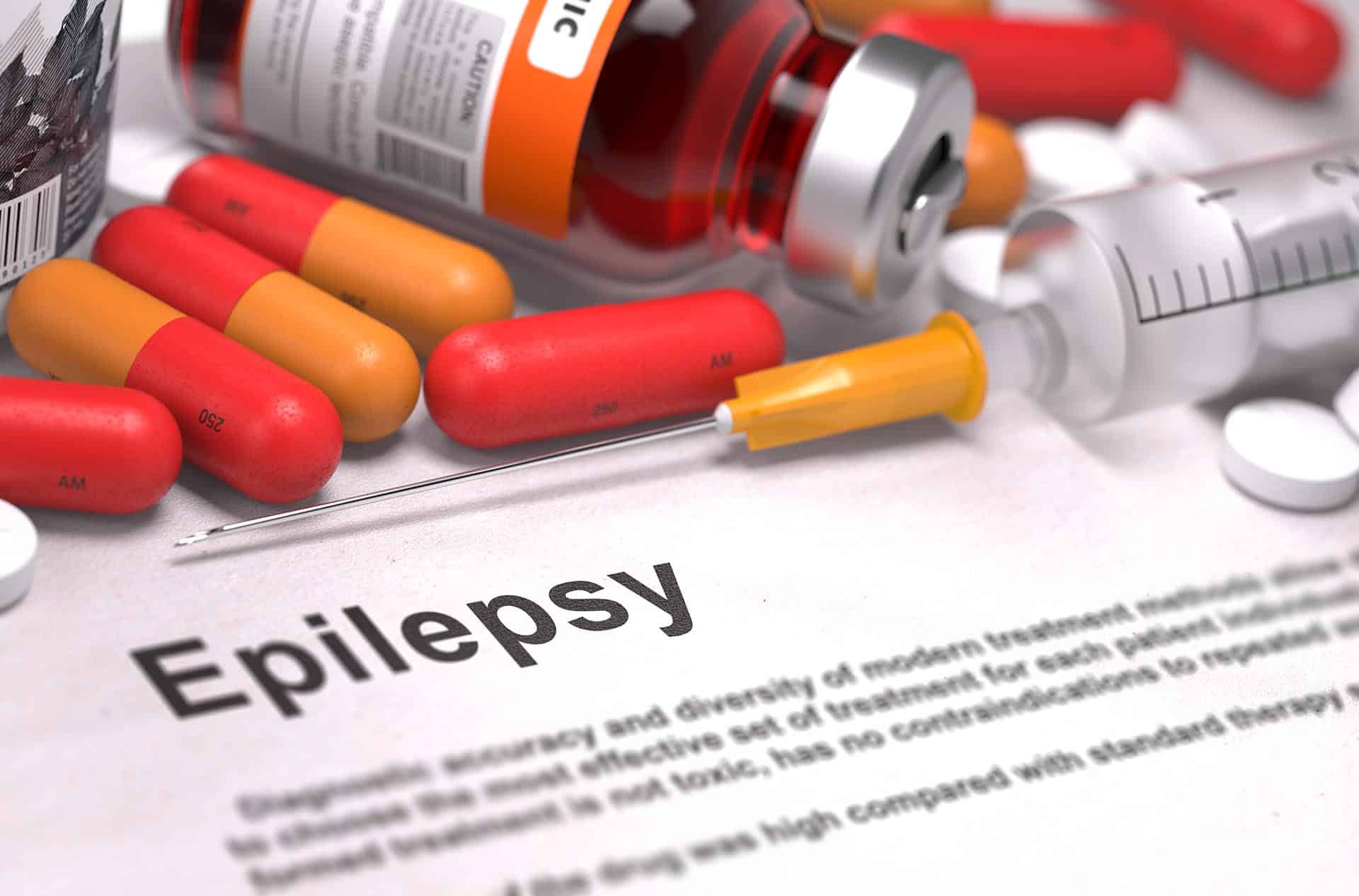 Diagnosis - Epilepsy. Medical Report with Composition of Medicaments - Red Pills, Injections and Syringe. Selective Focus.